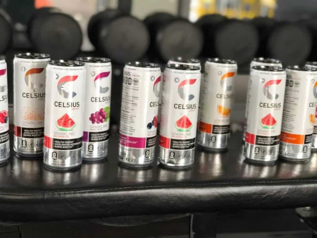 Celsius energy drinks on a bench