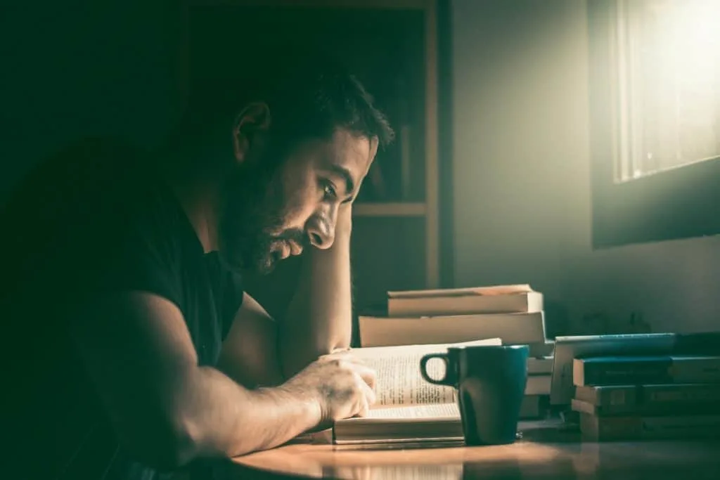 Picture of man focusing on his studies
