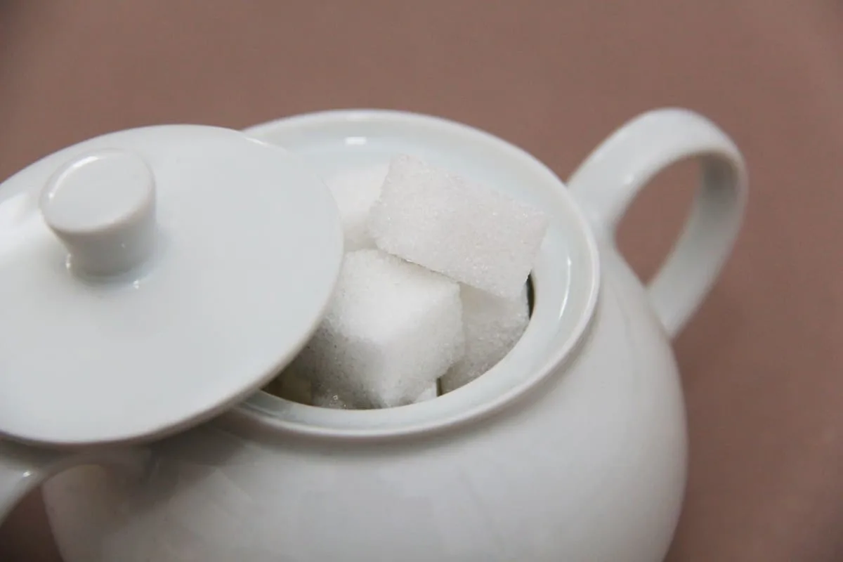 A photo of sugar cubes in a pot.