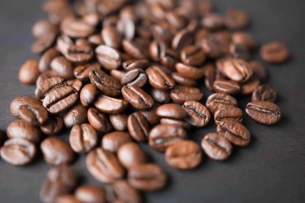 A picture of caffeine beans with black background.