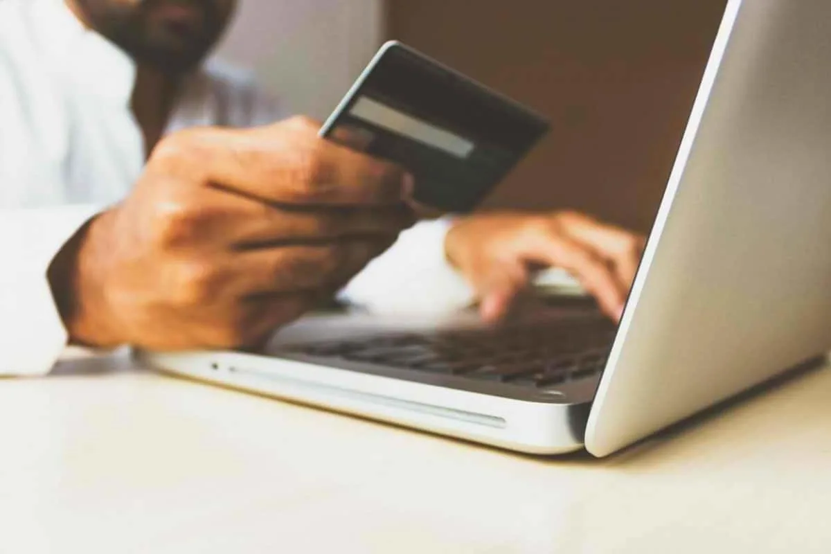 A photo of shopping online using credit card