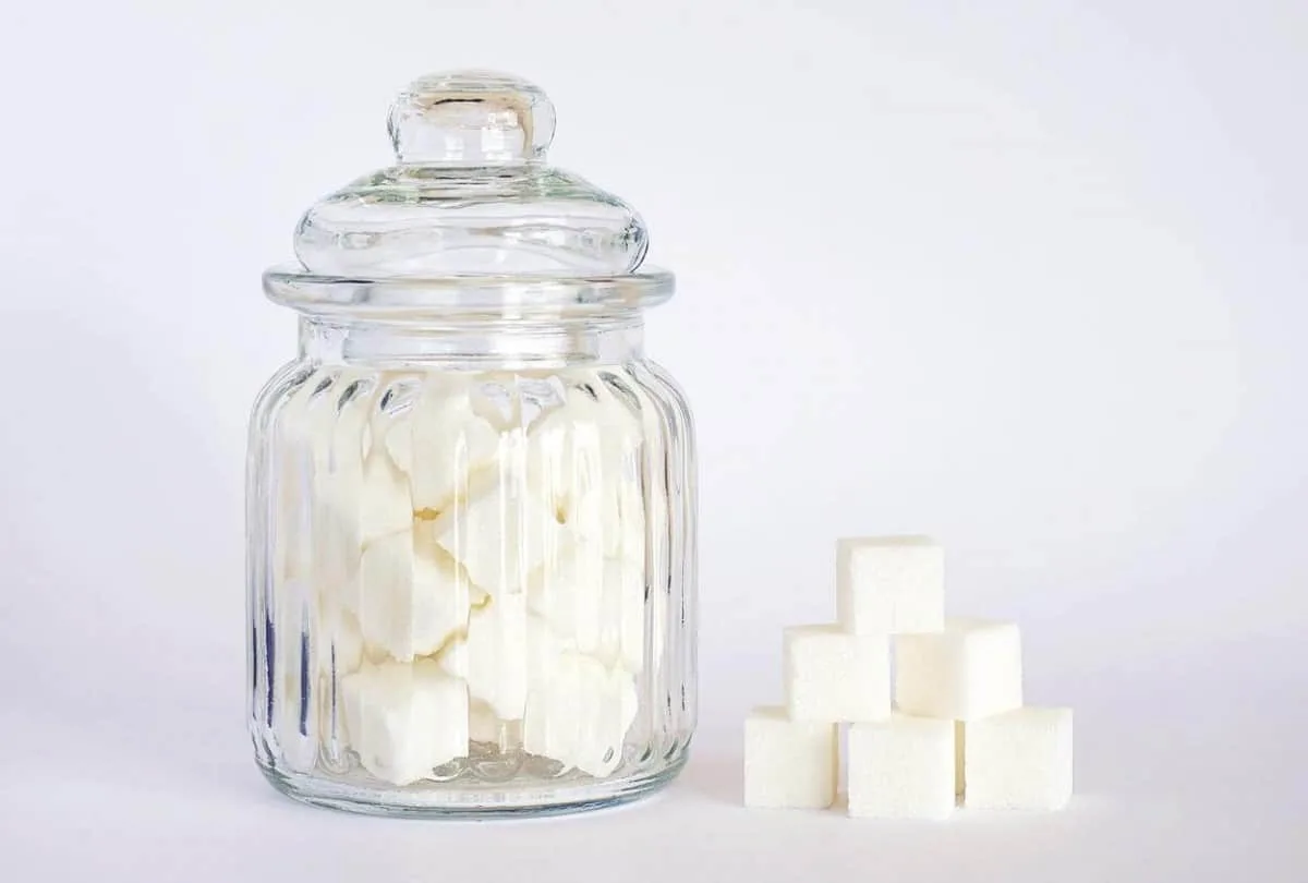 Sugar cubes in a canister.