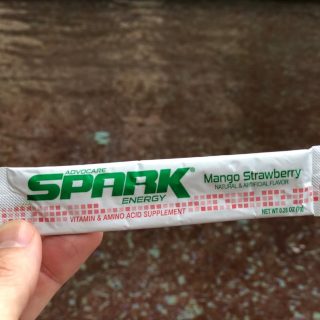 A packet of Advocare Spark in Mango Strawberry flavor