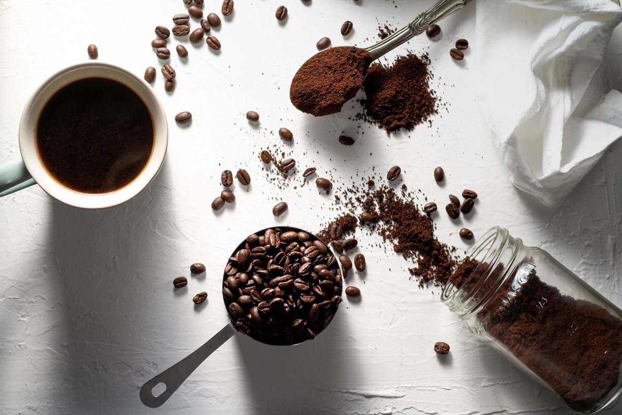 An image of coffee beans and brewed coffee 