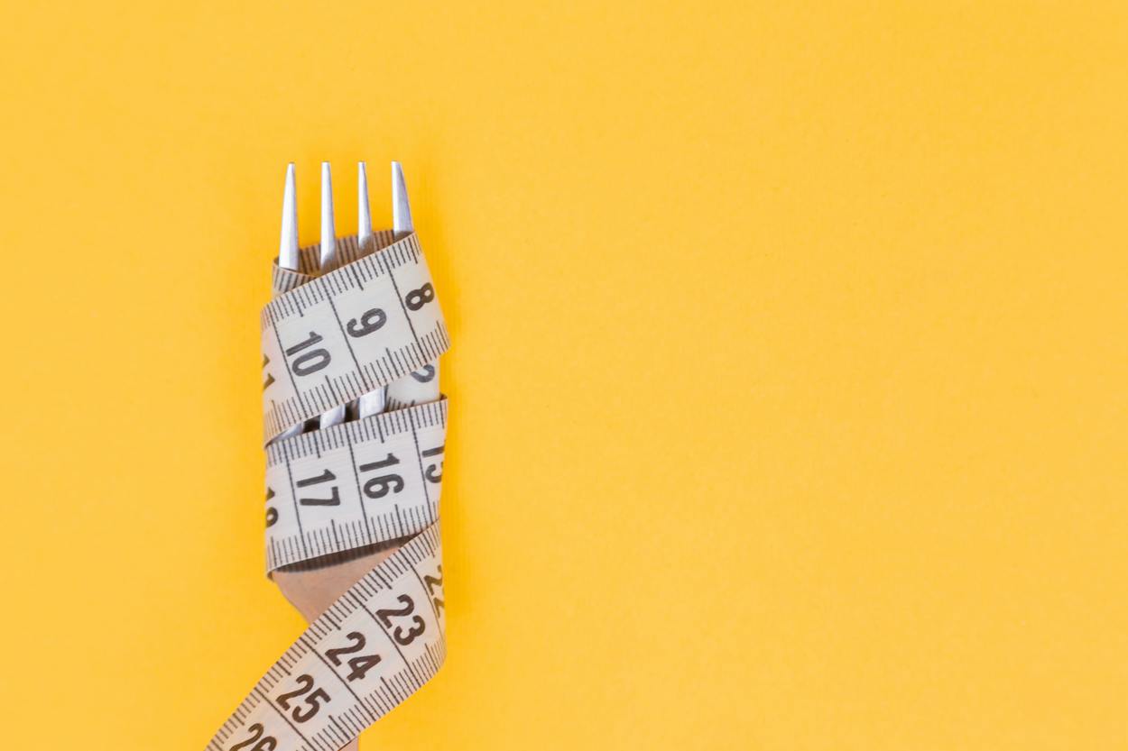 A fork with tape measure.