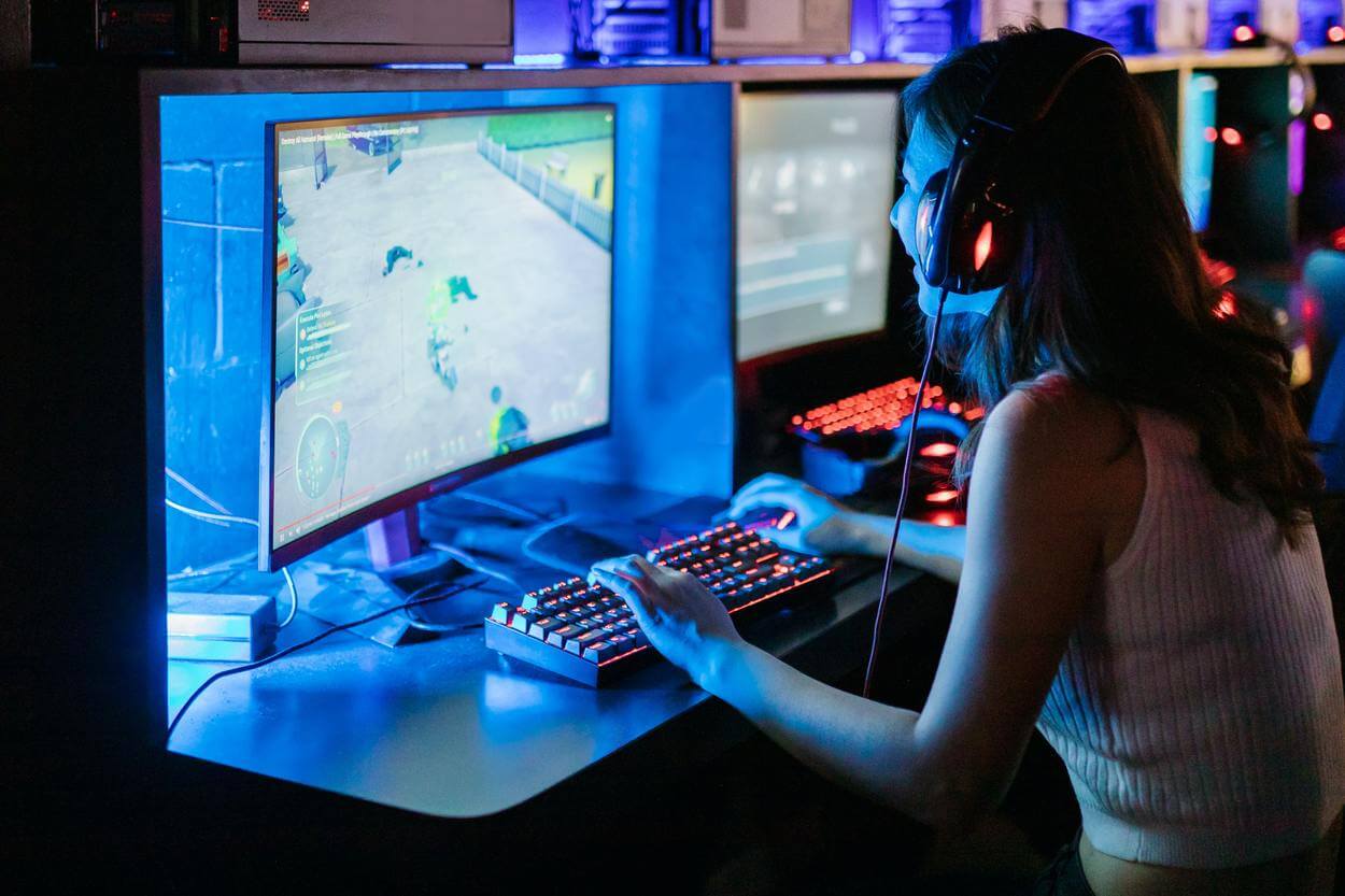 A woman playing computer games.