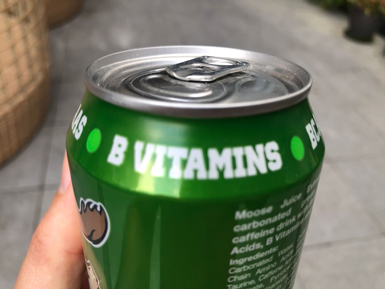 B-Vitamins label printed at the can of Moose juice.