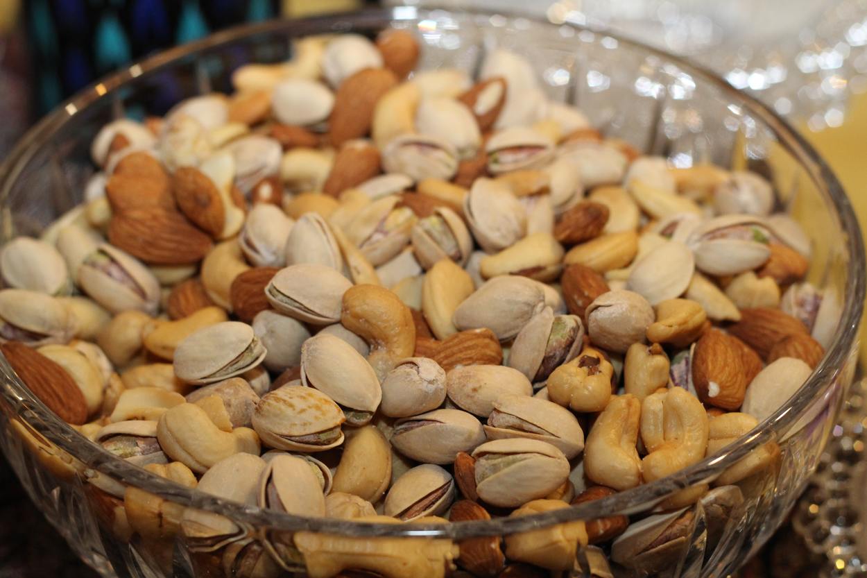 An image of a bowl containing different nuts