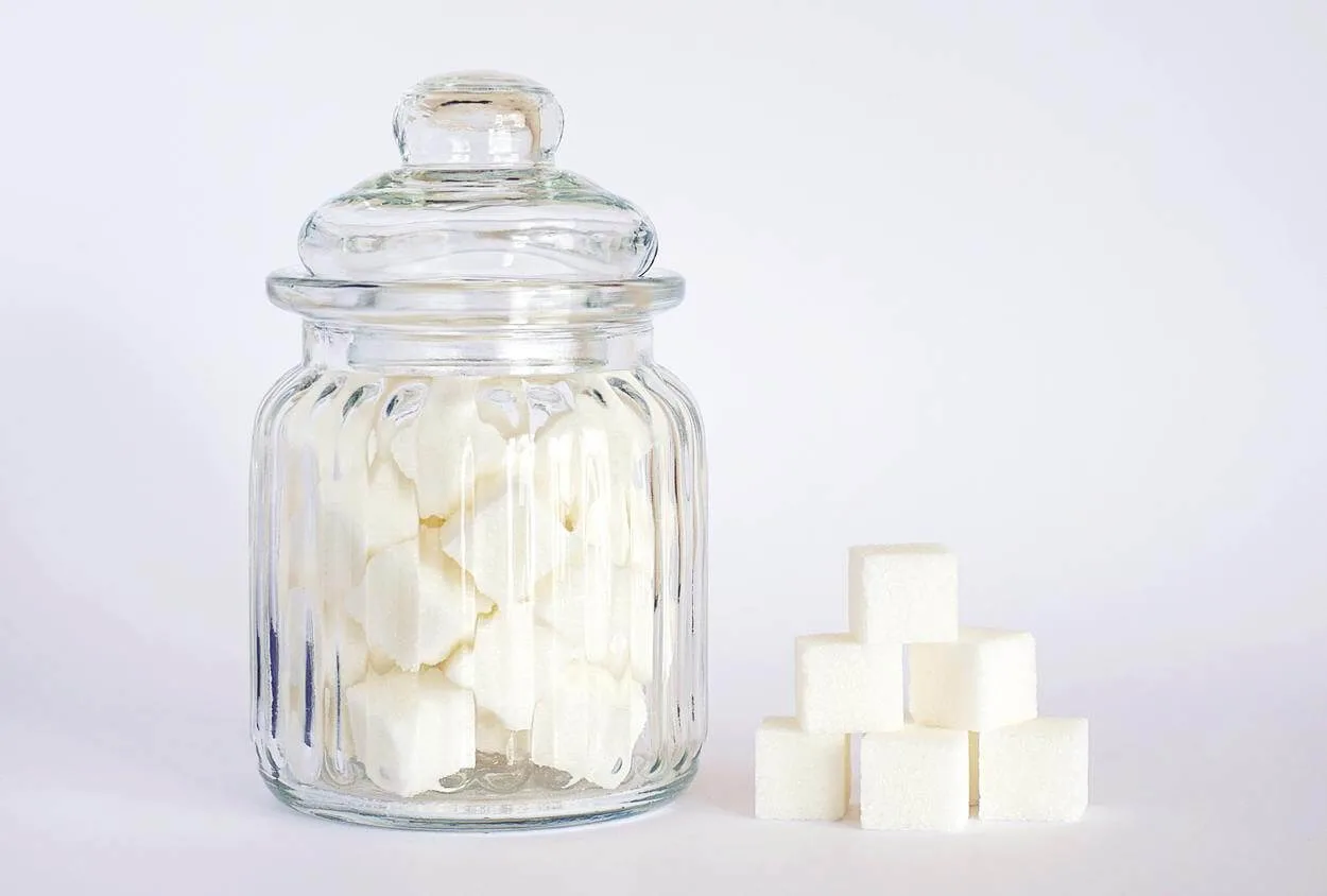 Sugar cubes in a container.