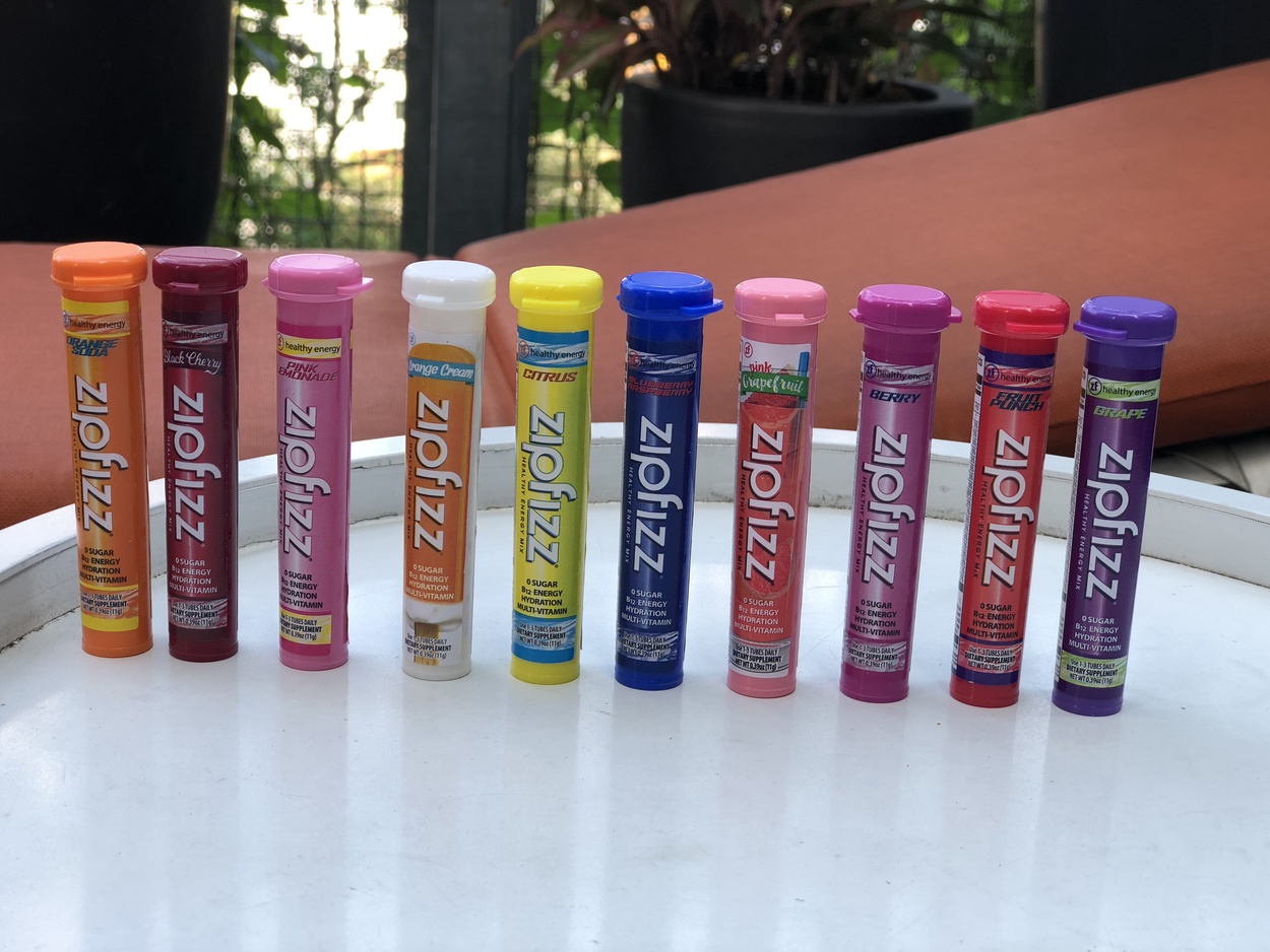 An image of tubes of ten flavors of Zipfizz energy drink.