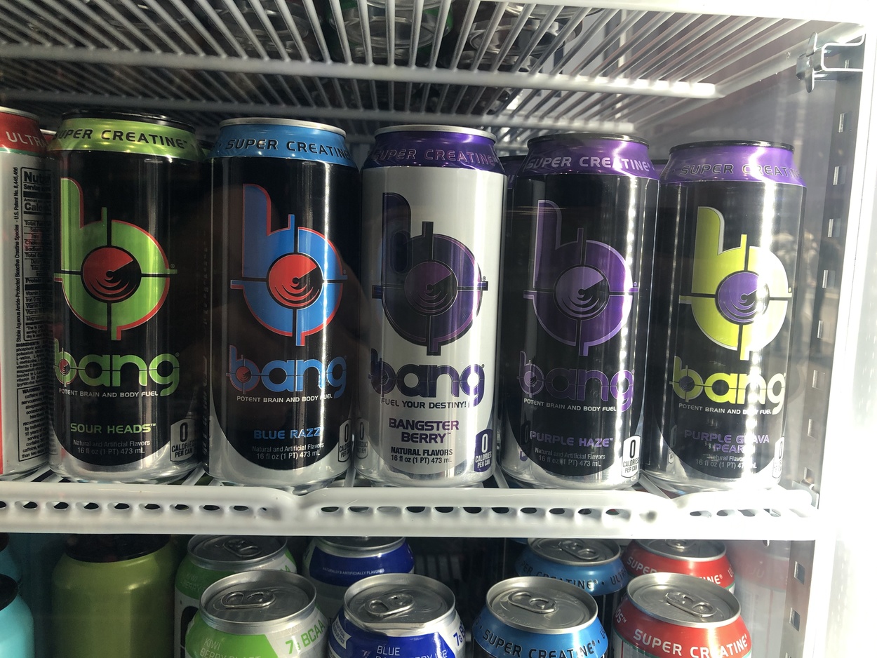 An image of shelf of store showing different flavors of Bang